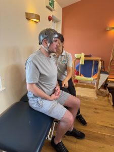 image of Oli sat on a plinth in our accessible gym