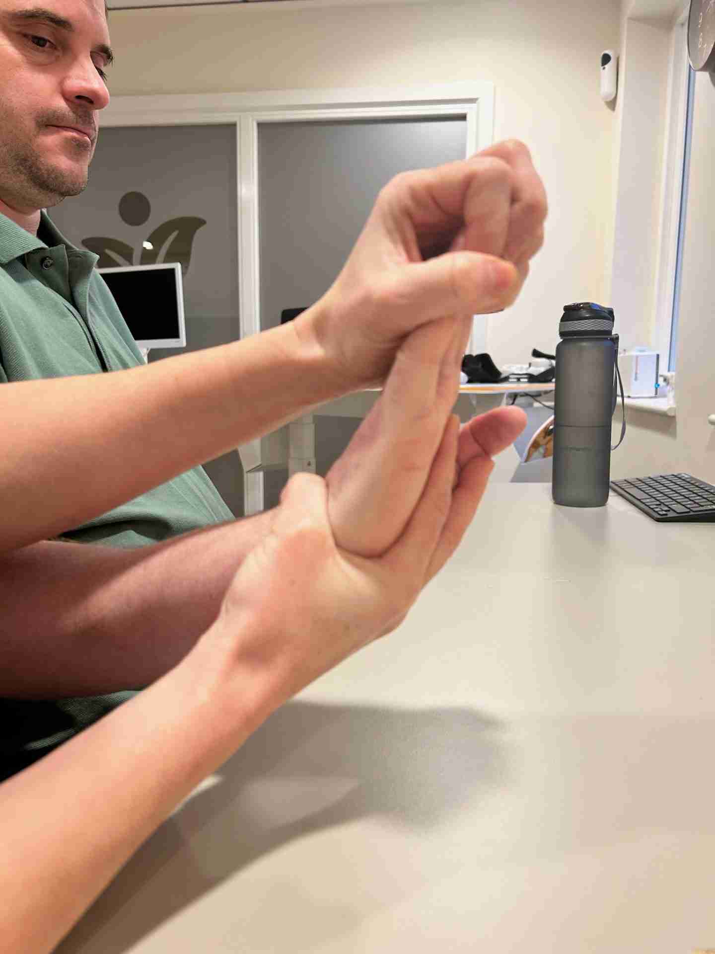 Image of Sid's hand being stretched