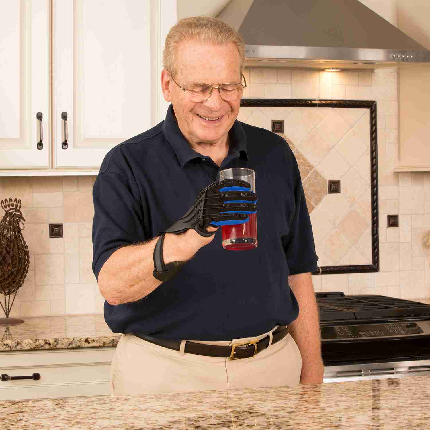 image of a man taking part in rehabilitative therapy at home to treat a hand and arm condition