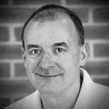 black and white headshot of Jon Graham